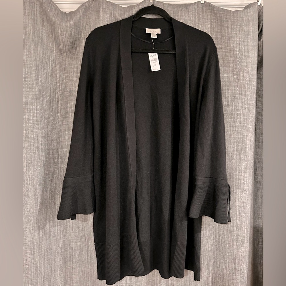 NWT THE LOFT LONG SWEATER. SOLID BLACK WITH BELL SLEEVES WITH TIES ON THE END